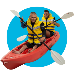 A person with a spinal injury kayaking with their support worker